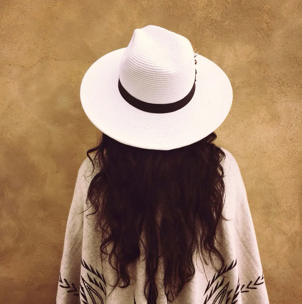 Desert essentials: a hat and a lightweight poncho