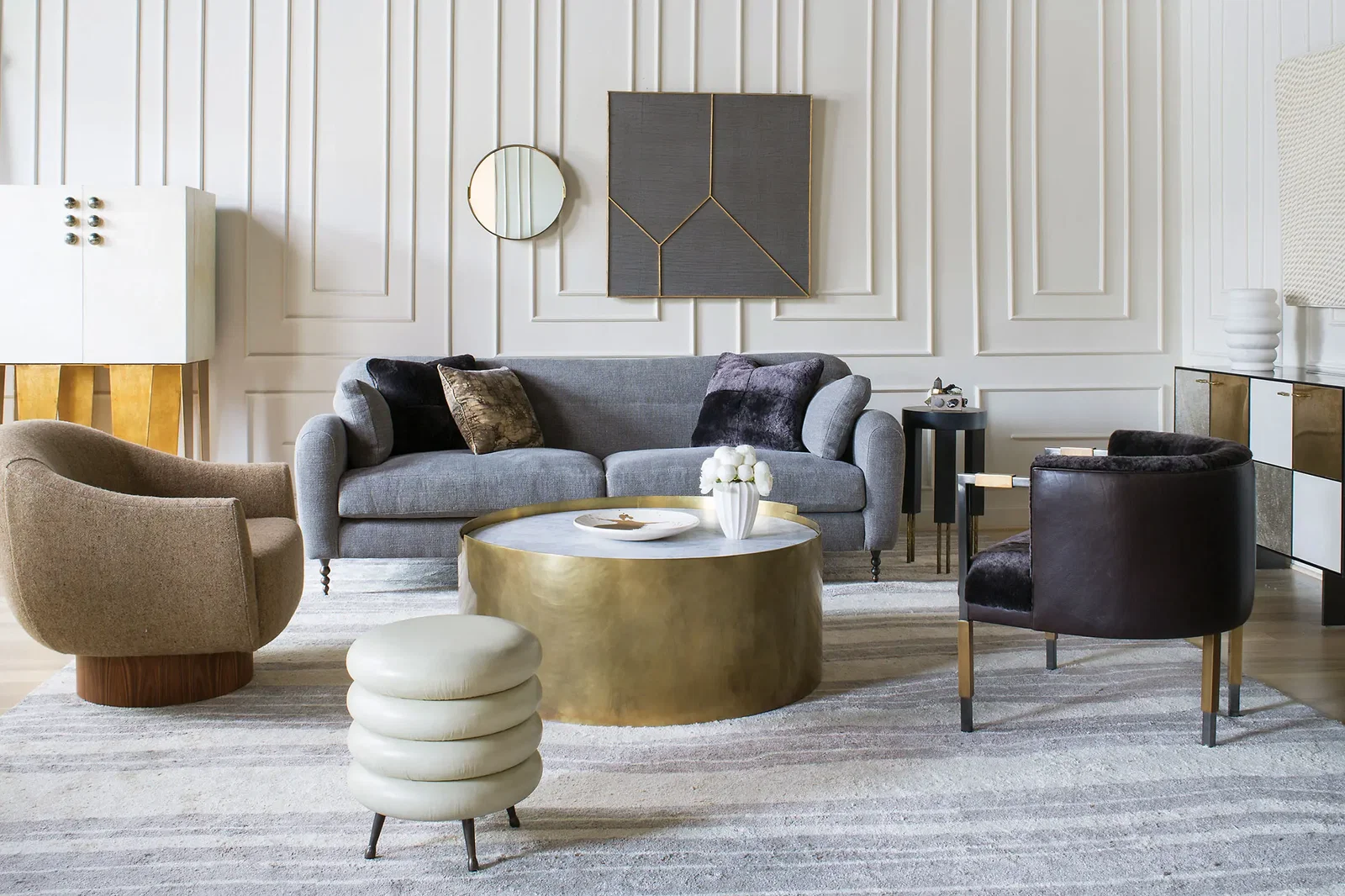Clockwise from left: Griffi th bar cabinet; Hillcrest sofa; Melange side table; Huntley cabinet; Larchmont chair; Alta coffee table; Laurel stool; Sonara swivel chair.