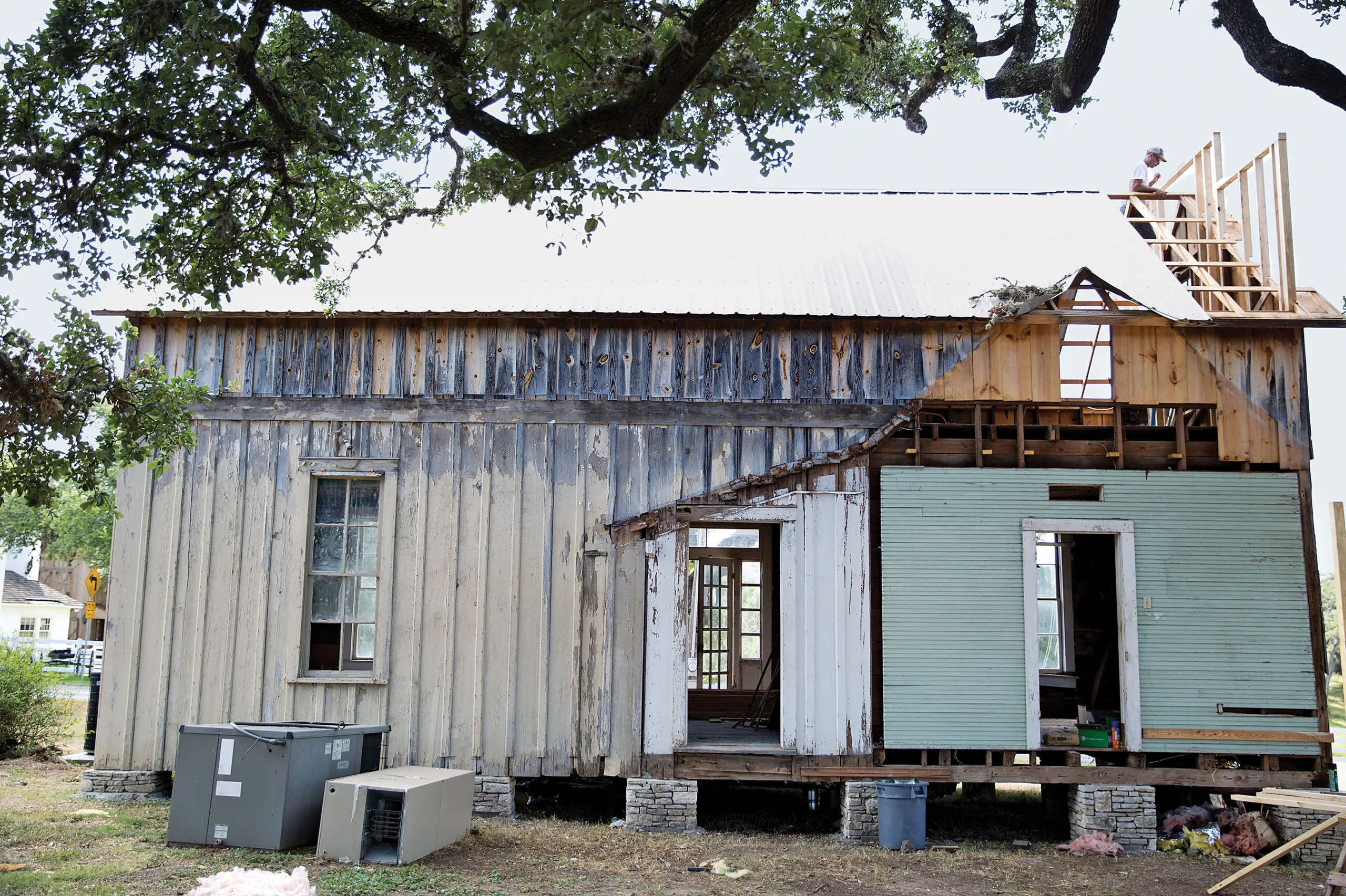 A vintage building undergoing restoration in Rummel Square.