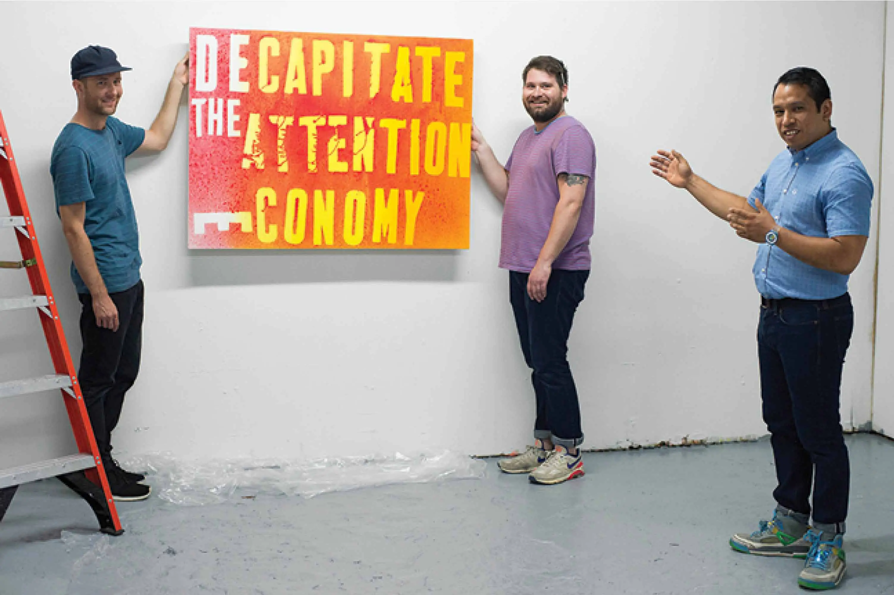 Alika Herreshoff, Lane Hagood and Pablo Cardoza install a Mark Flood show at Cardona Fine Art