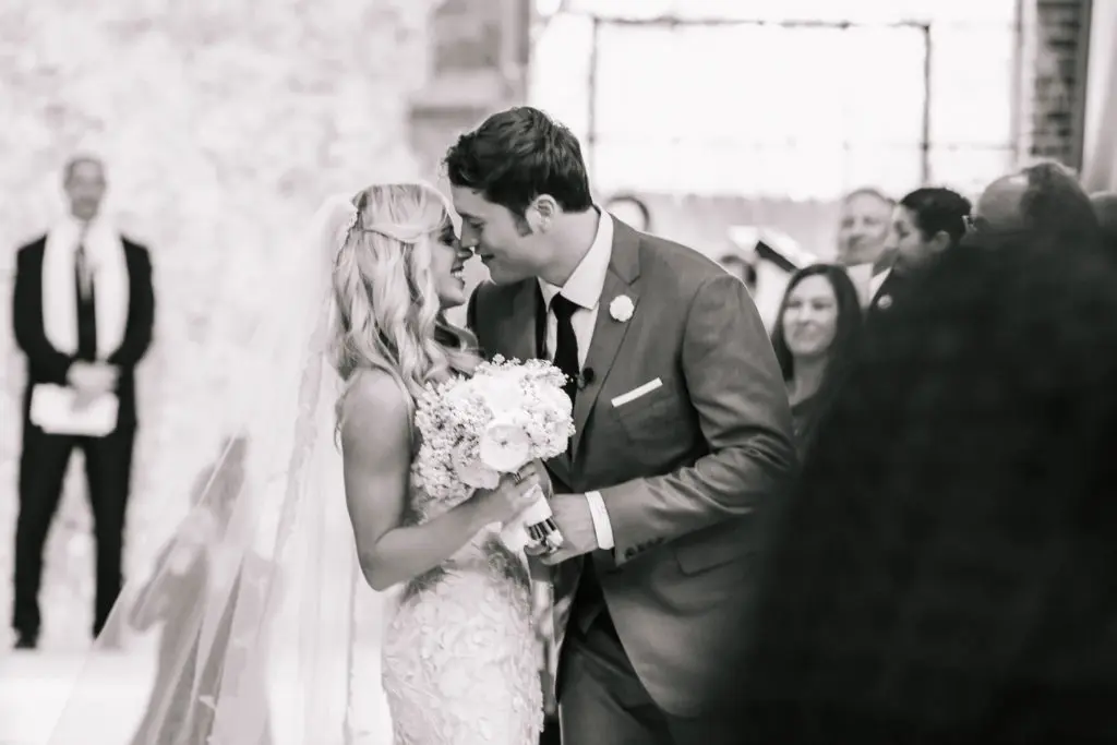 Matthew Stafford and Kelly Hall enjoy a moment on their wedding day.