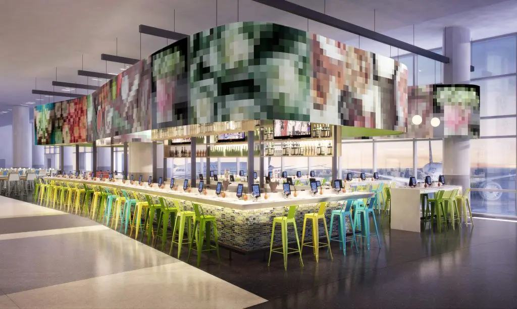 A colorful backdrop sets the stage for chef Monica Pope's panini bar. 