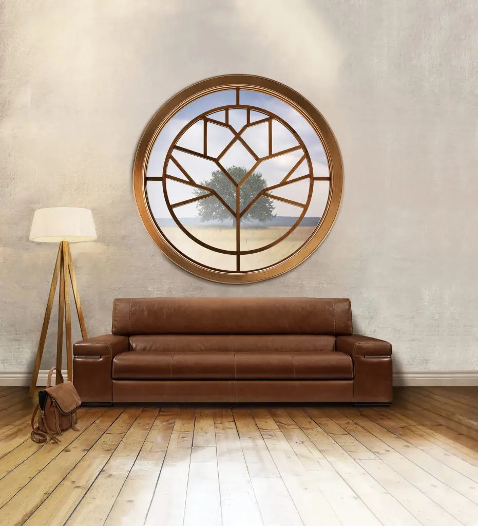 This E-Series Auxiliary Full Circle Window in maple with a golden hickory ﬁnish and custom grille pattern makes a statement and expresses personality