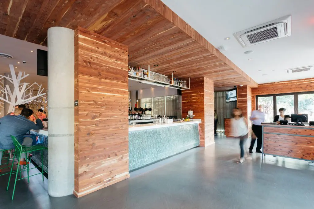 Cedar wood takes over the restaurant's entrance. 