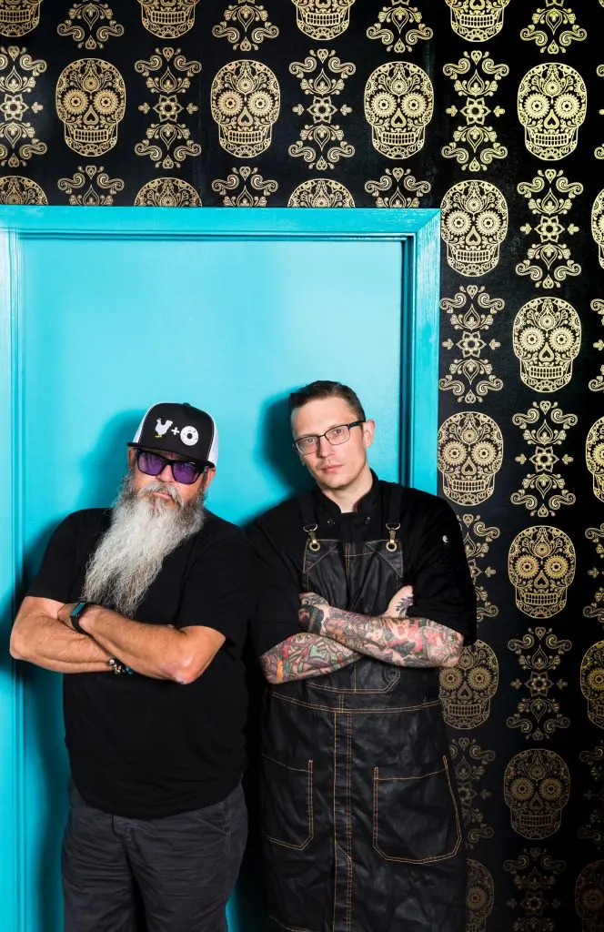 Restaurateur Lee Ellis and partner Anthony Calleo stand in the new Pi Pizza — a 2,000 sqaure-foot space designed by Austin architects Ellis and Kevin Stewart. 