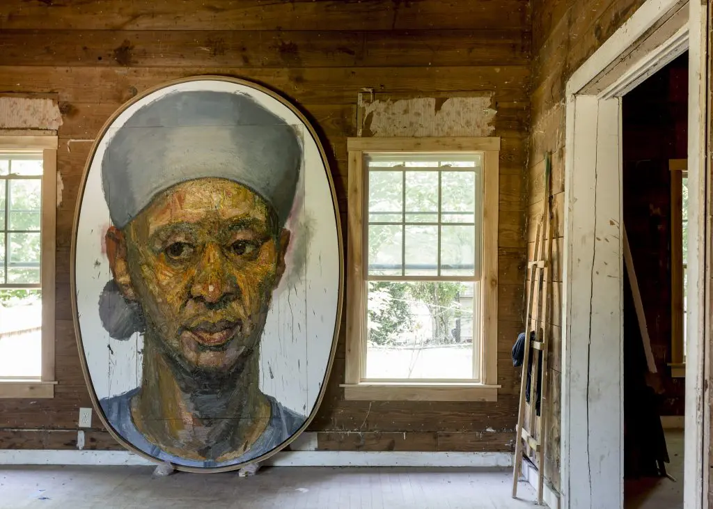 At Big Momma's House, a 2016 portrait of Huckaby's wife, artist Letitia Huckaby, stands watch.