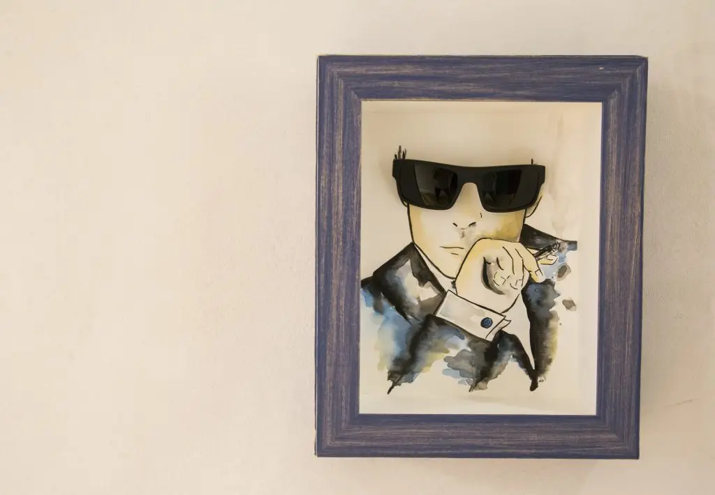 Another sketch of Butler's hangs next to the men's bathroom