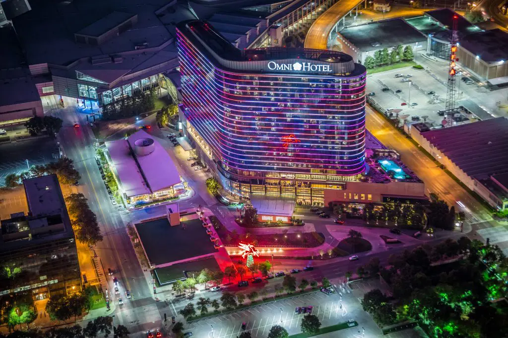 Omni Dallas lights up and stands out in the downtown skyline.