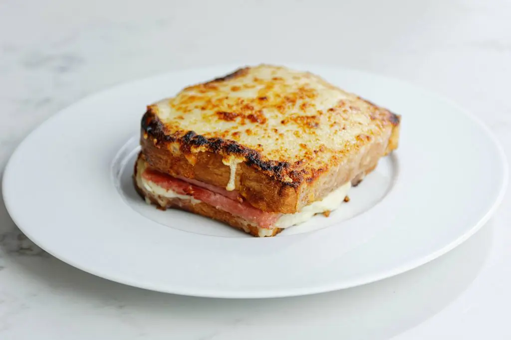 Pair your Croque Monsieur with salad or pommes frites. 