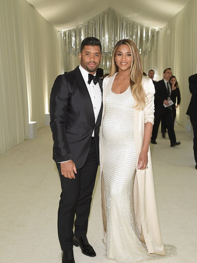Ciara in an August Getty Atelier knit gown with husband Russell Wilson 