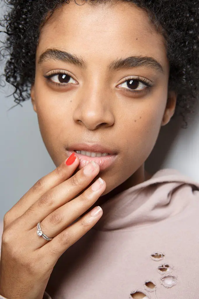 Jinsoon helped Tibi achieve this simple nail look — a single pop of color.