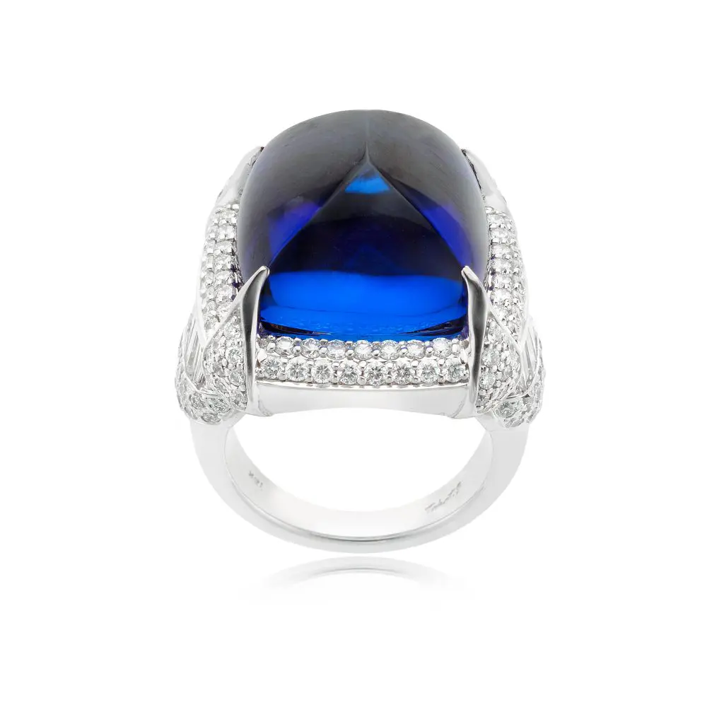 William Noble Tanzanite Ring: 18K white gold, tanzanite, and diamond ring with a 30-carat sugar loaf tanzanite accented with 3 carats of diamonds