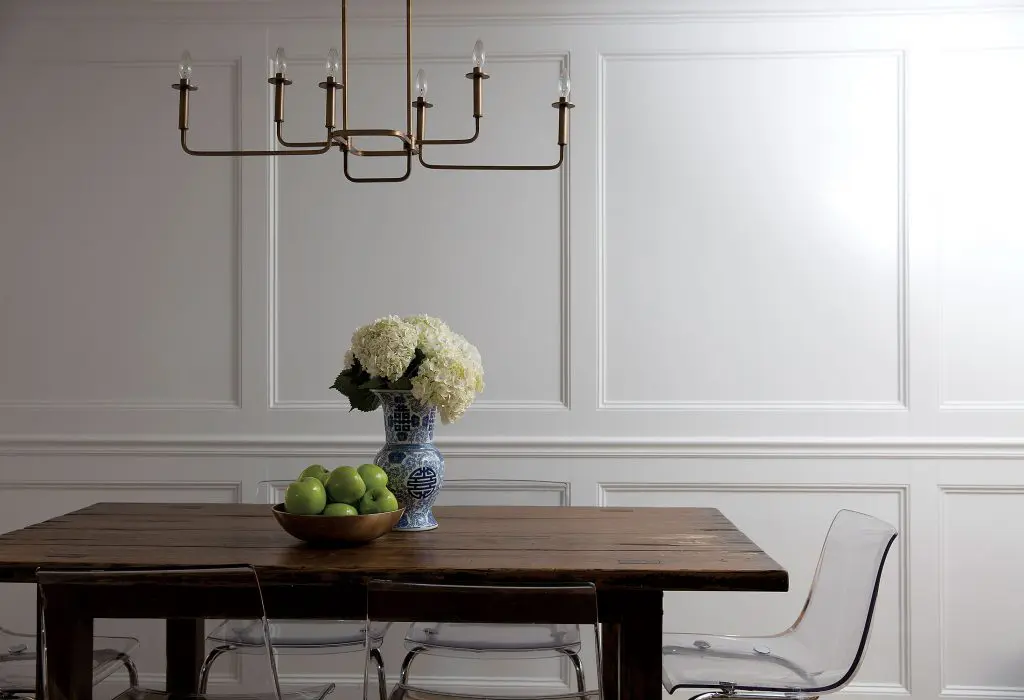 In the breakfast room, custom paneling, Restoration Hardware table, IKEA chairs. Kichler chandelier.
