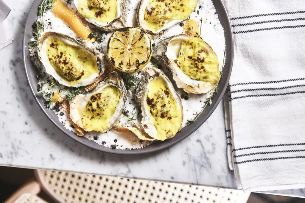 The oysters gratin at City Hall Bistro, a new Dallas restaurant.