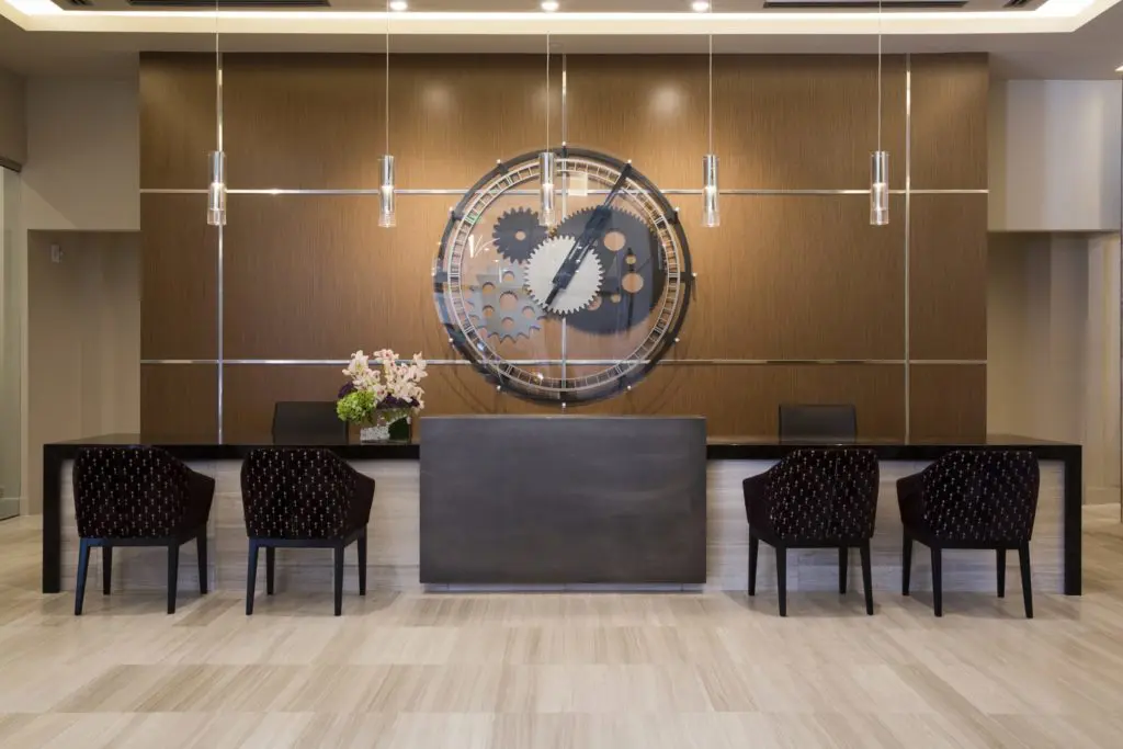 The large clock in the lobby at Aris Market Square is a homage to the nearby historic clock tower. (Photo by Jenny Antill.)