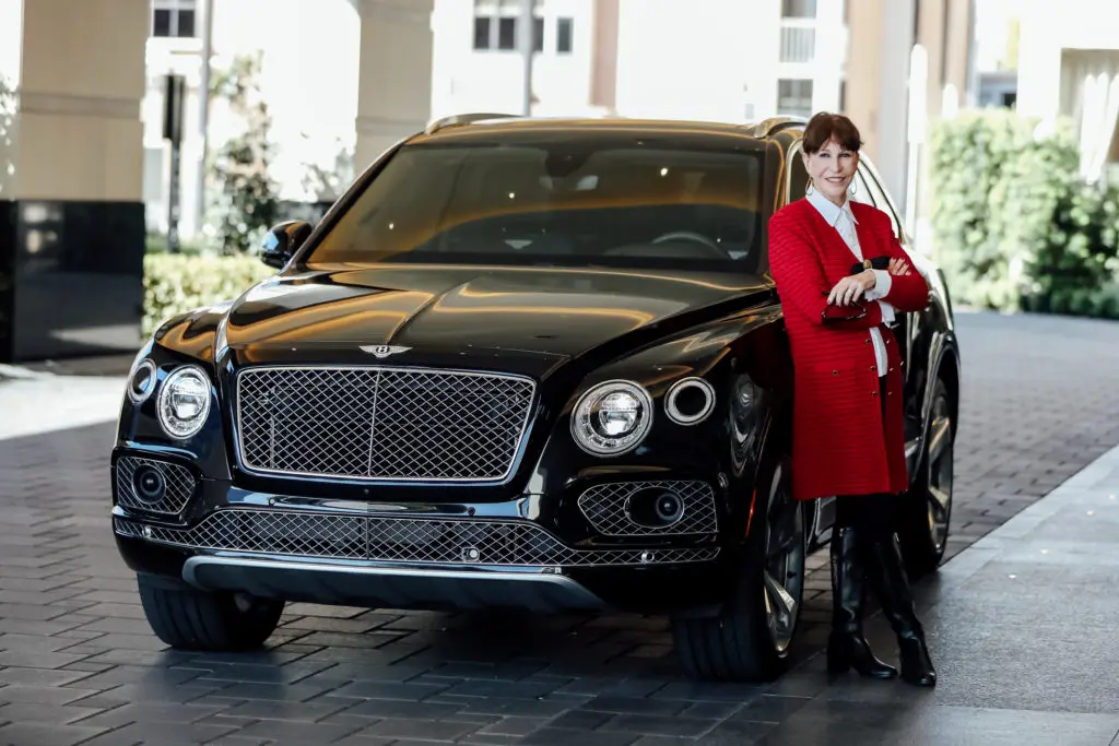 The start of a beautiful friendship, PaperCity's Shelby Hodge and Post Oak Motor Cars' Bentley Bentayga. (Photo by Johnny Than.)