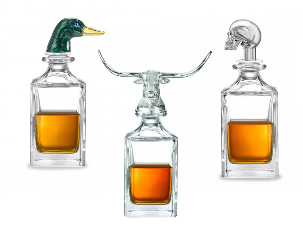 A selection of silver and crystal decanters by Deakin & Francis, $976 each. 10 designs available.