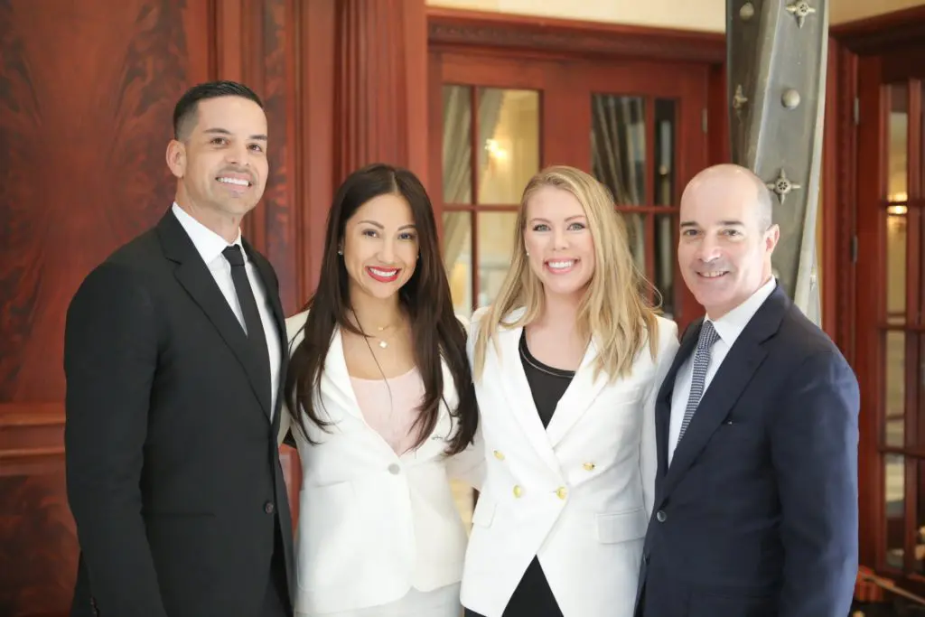 Nan and Company Properties' Jose and Nancy Almodovar, Christie's International Real Estate vice president of business development Natalie Hamrick and CEO Dan Conn