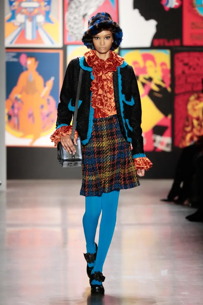 Anna Sui tweed skirt, ruffled blouse, jacket with contrasting trim. (Photo by Anna Sui)