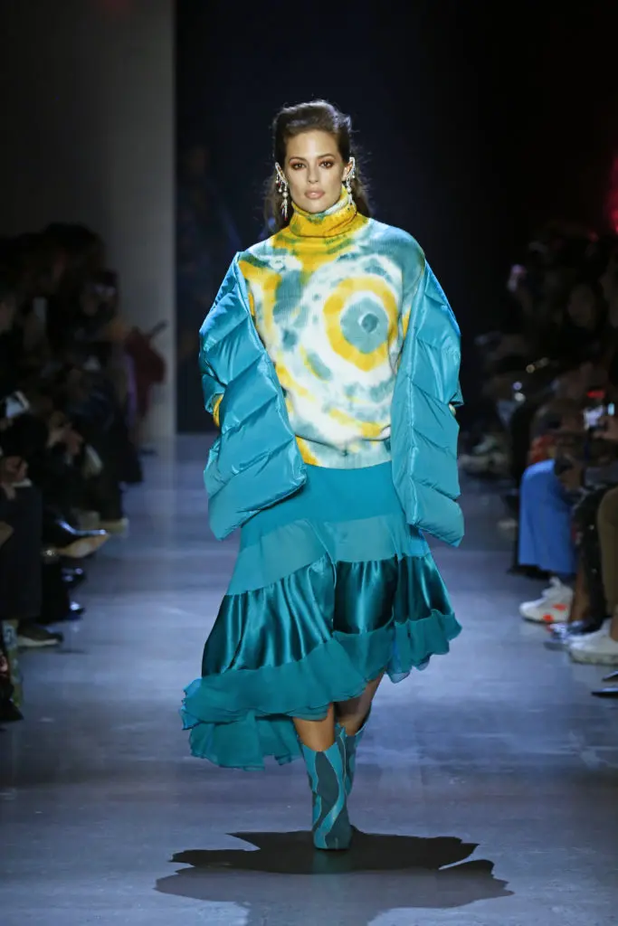 Prabal Gurung turquoise nylon down-filled puffer stole, tie-dye cashmere knit turtleneck, bias-cut skirt with silk chiffon inserts and cascade ruffle hem. (Photo by Prabal Gurung)
