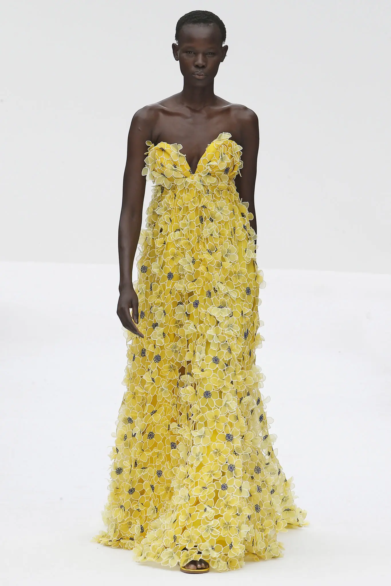 Carolina Herrera mimosa yellow multi floral embroidered strapless organza gown. (Photo courtesy of Carolina Herrera)
