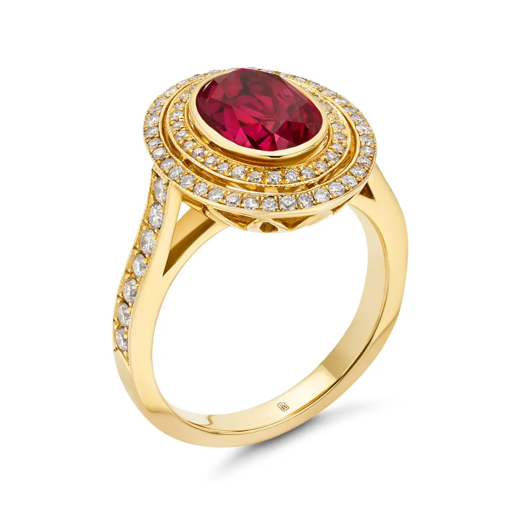 Fiery Ring featuring a glowing ruby surrounded by sparkling diamonds set in 18K rose gold.