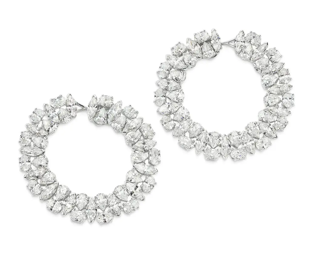 Diamond Hoop Earrings in 18K white gold with 22.93 carats of marquis, oval and pear cut diamonds. 