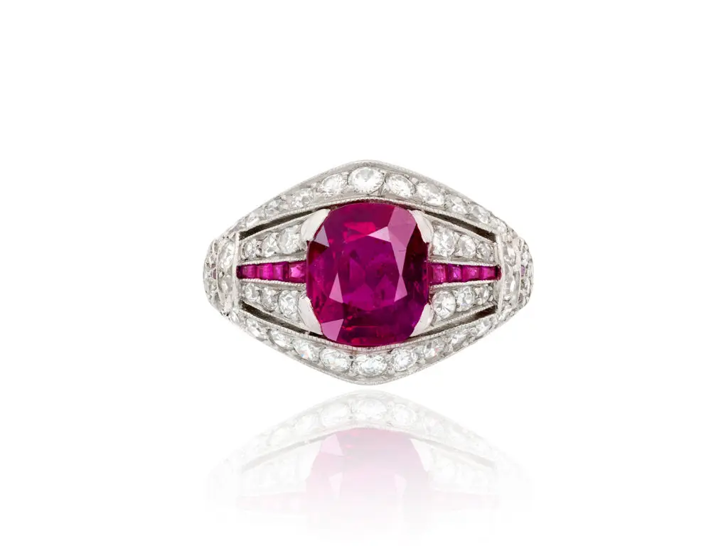 Art Deco natural, no heat cushion-cut Burmese ruby and diamond ring set in platinum, circa 1920.
