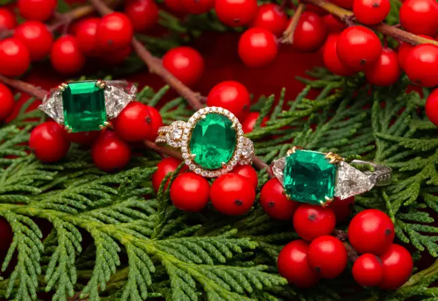 A selection of classic emerald and diamond rings; available in store