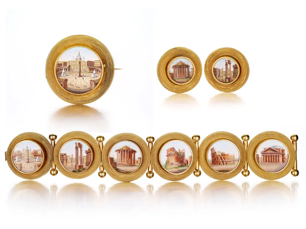 Victorian 18K yellow gold micromosaic jewelry suite depicting scenes of Rome, made in the Vatican workshops, circa 1850.
