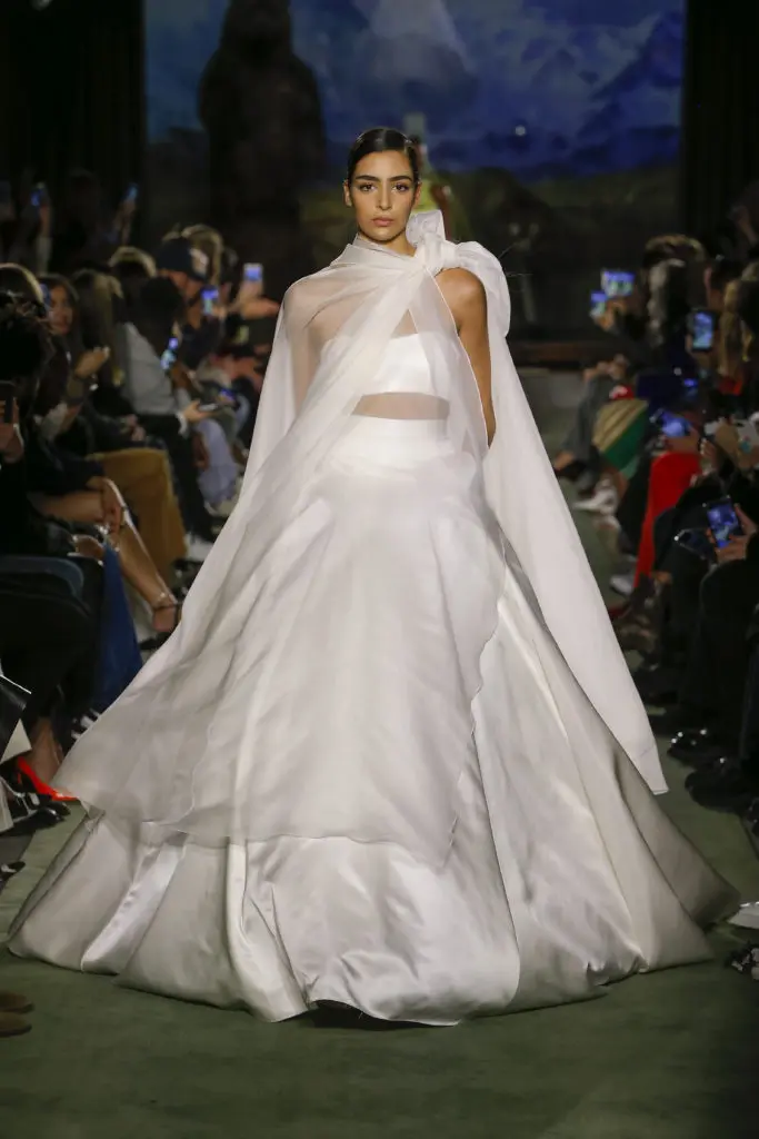 Brandon Maxwell white gown with cut-out at the waist. (Photo by Monica Feudi)