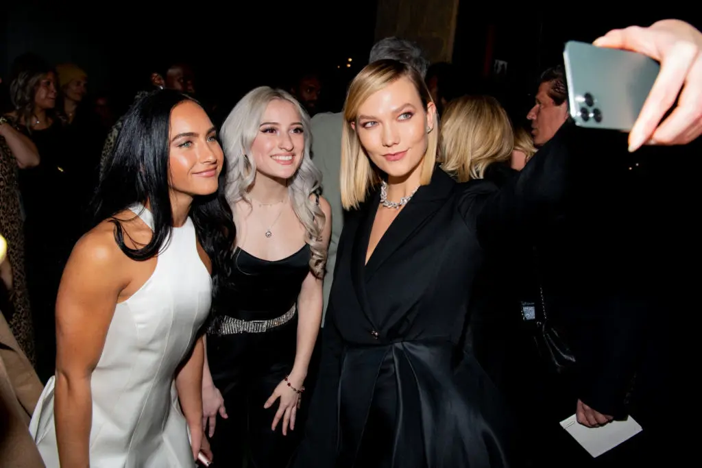 Karlie Kloss takes a selfie with "Cheer" stars Lexi Brumback and Gaby Butler at the Brandon Maxwell runway show.(Photo by @kevintachman)