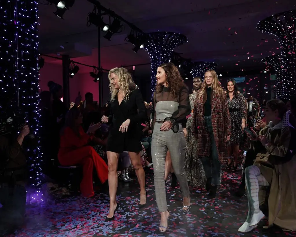 Sisters-in-law Veronica Miele Beard and Veronica Swanson Beard take a bow after their first runway show at New York Fashion Week. (Photo by Imaxtree)
