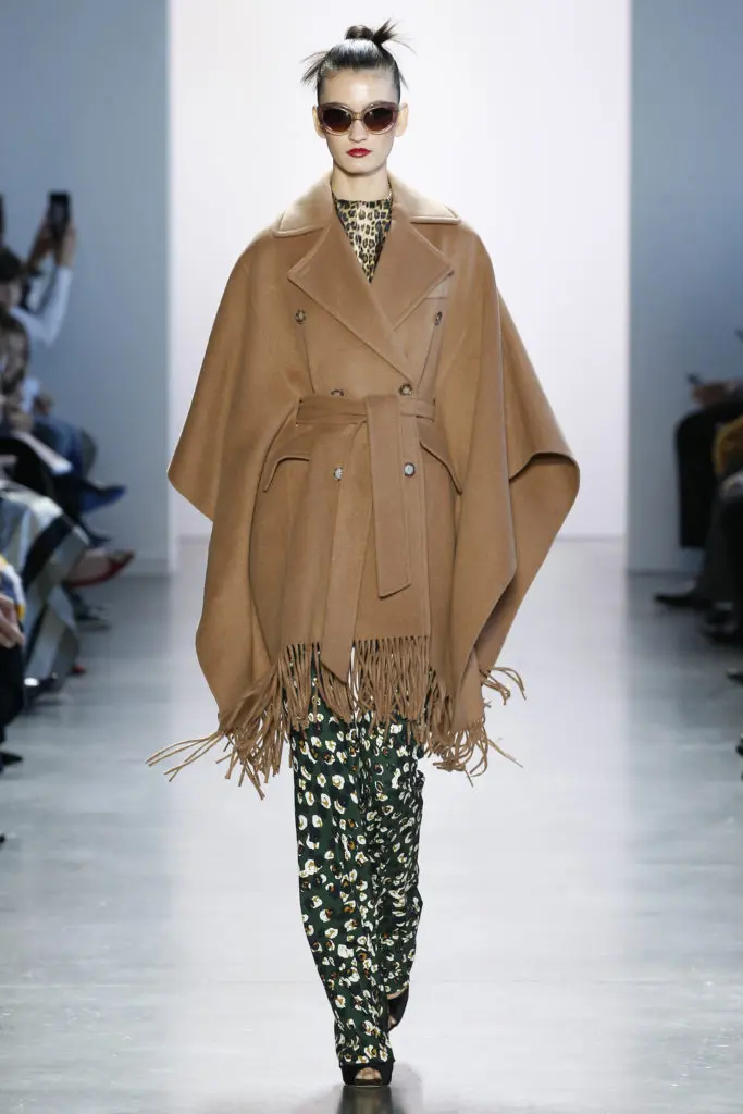 Badgley Mischka camel poncho, floral slacks. (Photo courtesy of Badgley Mischka)