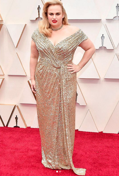 Actress Rebel Wilson garnered rave fashion reviews at her first Oscars in a custom designed gold sequined gown by Jason Wu. (Instagram: @jasonwu)