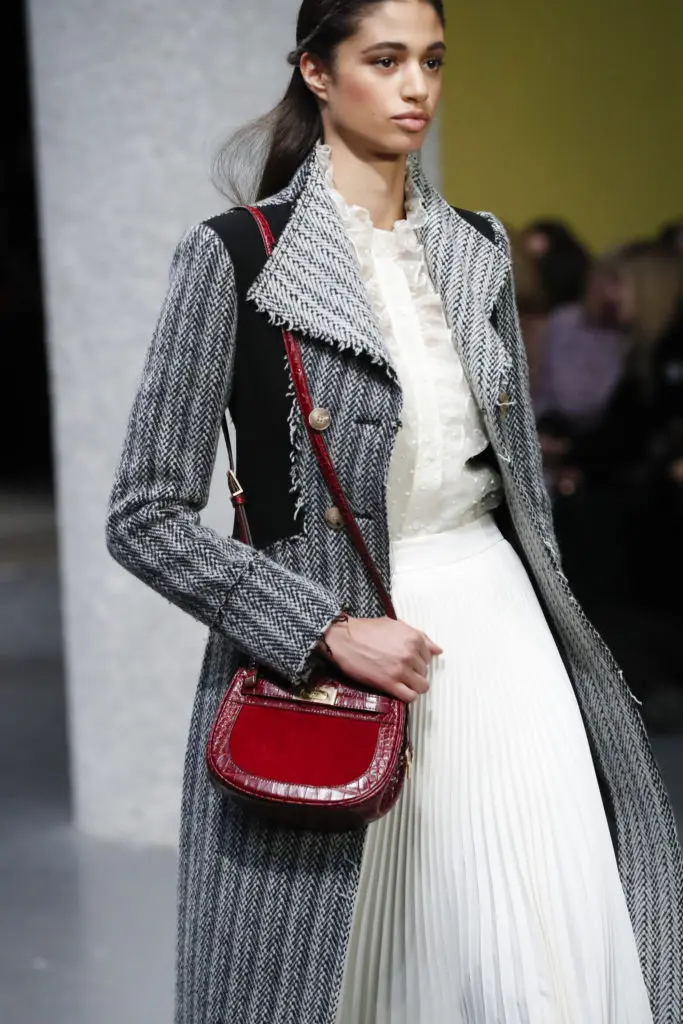 Tory Burch Lee Radziwill embossed frame small saddlebag. (Photo by Tory Burch)