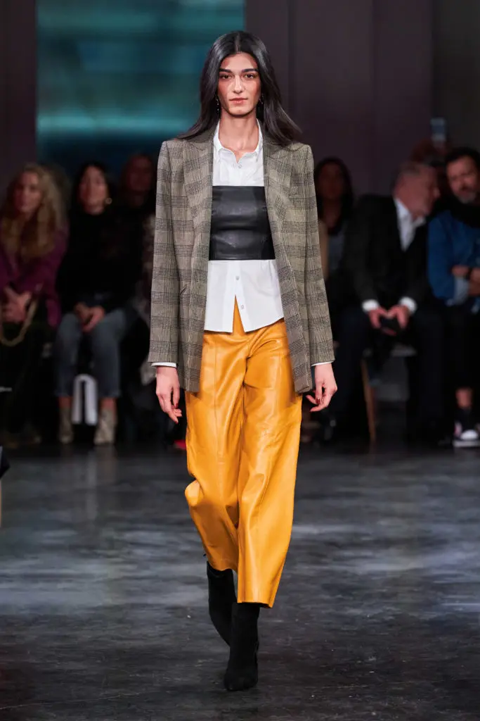 Veronica Beard Sen shirt, Jalisa bustier, Oria dickey jacket, Agee pants, Lisa booties. (Photo by Imaxtree)
