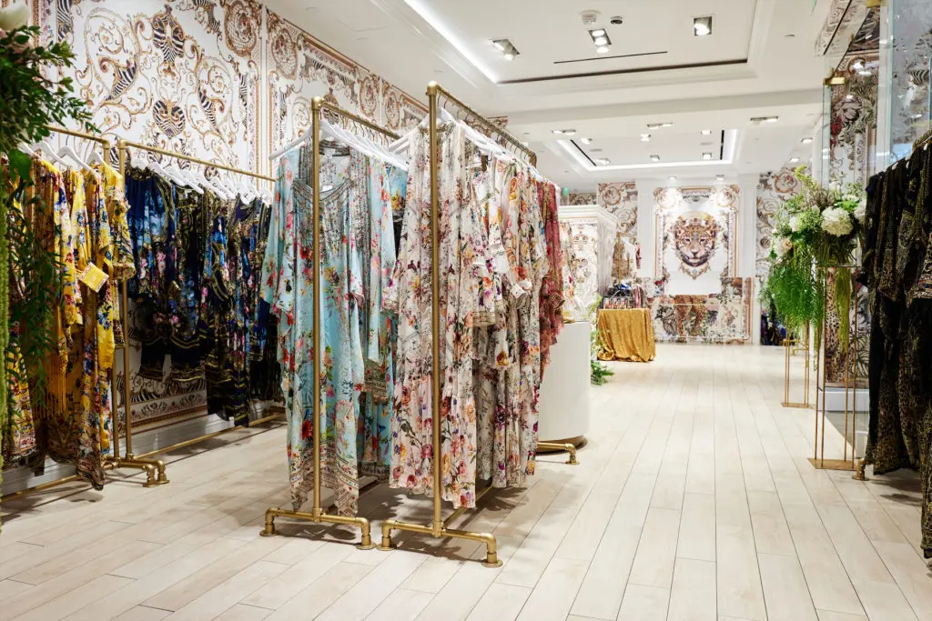 The Camilla store is lined with vibrant caftans, party dresses, and swimwear.