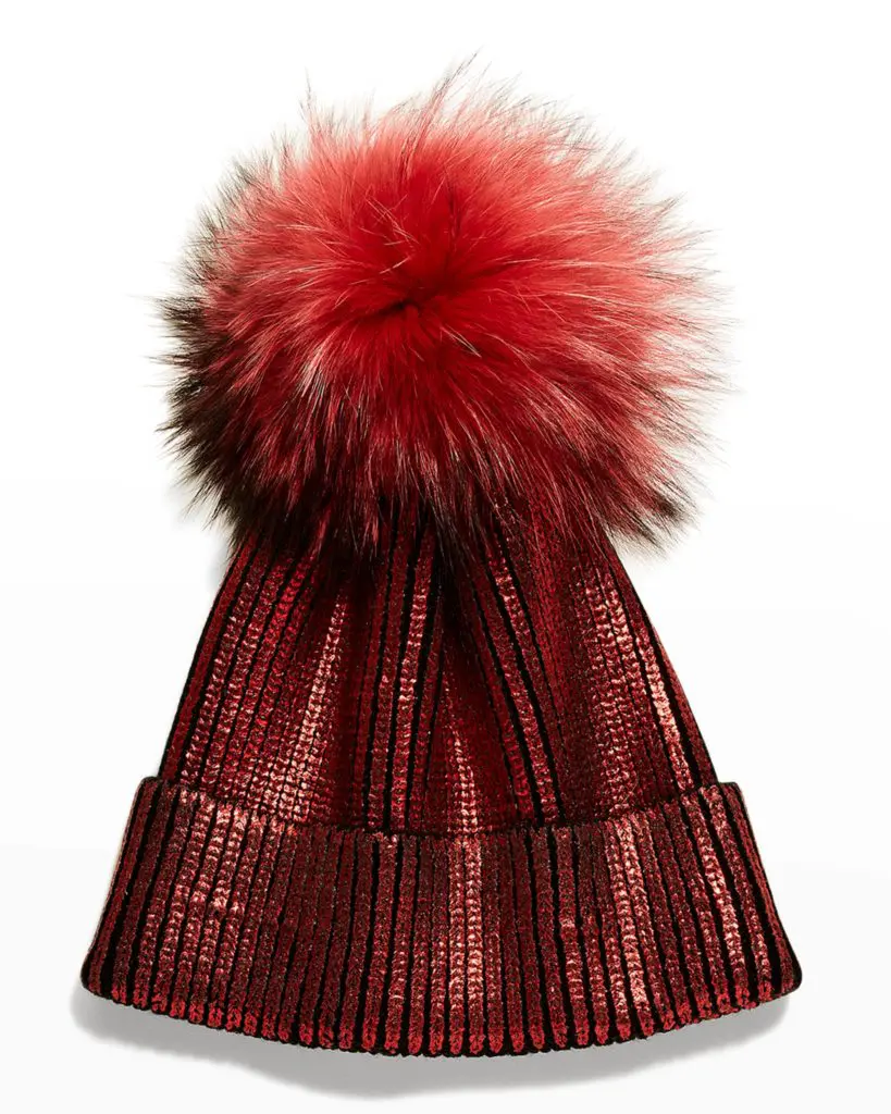 Adrienne Landau ribbed metallic beanie with fox pom pom.
