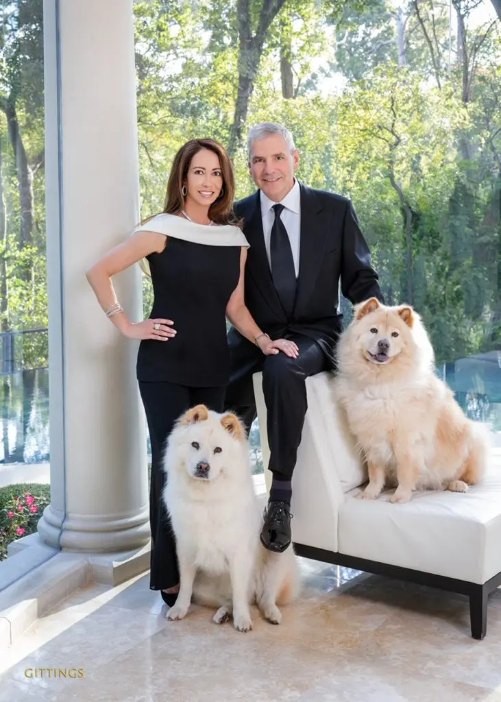 Lisa and Stan Duchman with their beloved chows, Daisy and Jake. (By Gittings and jewelry by Valobra Master Jewelers)© Gittings Photography - HF56316