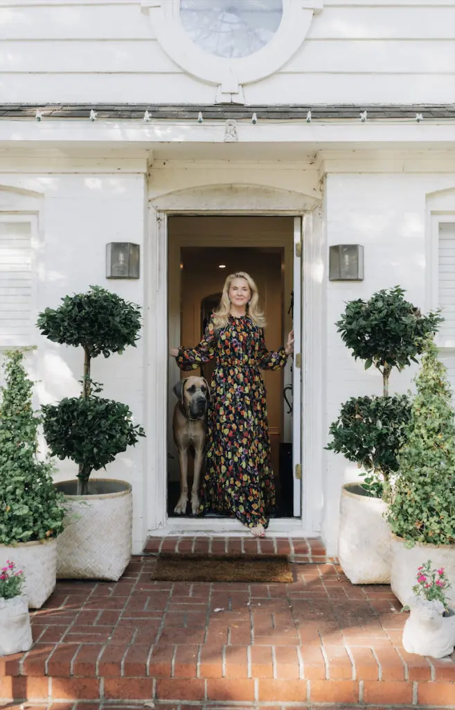 Cornelia Guest with her Great Dane, Wolf, at her Highland Park home. (Photo by Afritina Coker)