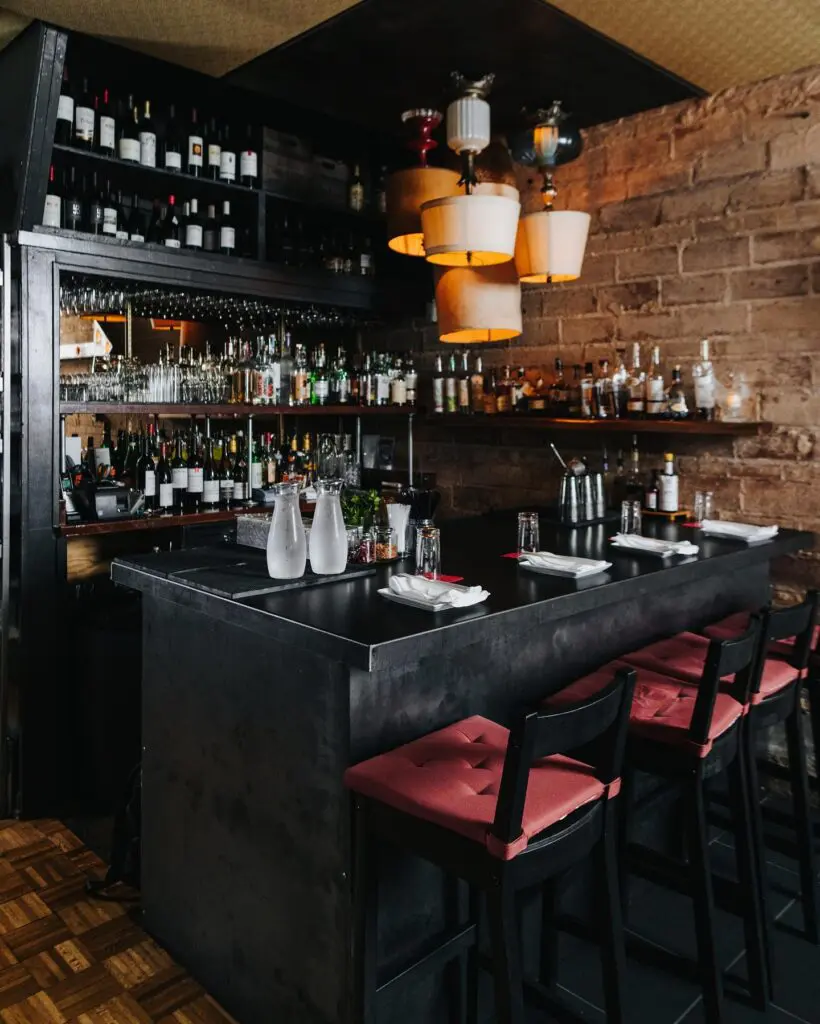 The bar at Mot Hai Ba offers craft cocktails, wine, and beer. (Photo by Kathy Tran)