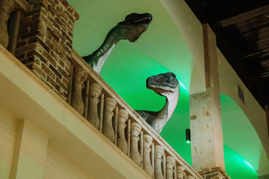 The "It's a jungle out there" party featured dinosaurs peering over the balcony.