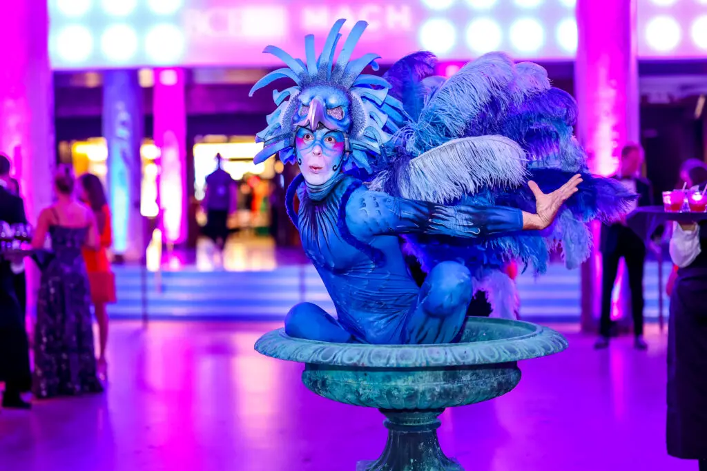 A squawking bird welcomes guests to the Children's Fund 'An Evening of Mystère!' gala (Photo by Wilson Parish)