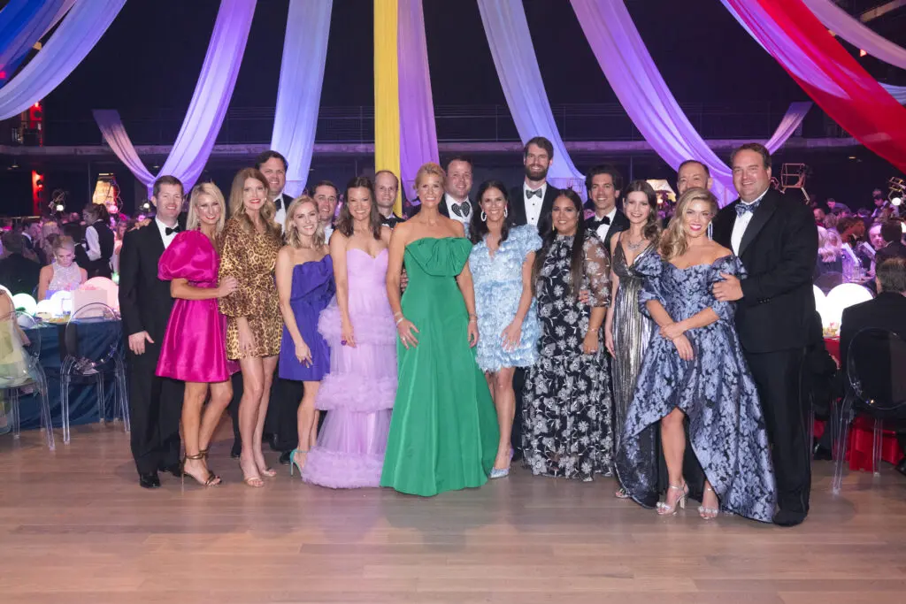 The Children's Fund events team lines up a group photo at the Children's Fund 'An Evening of Mystère!' gala held at the 713 Music Hall (Photo by Wilson Parish)