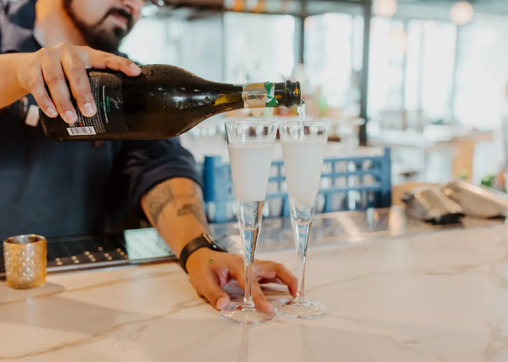 Bubbly flows at the sip and shop, pop-up shopping event at Georgia James steak house. (Photo by Emma Umana)
