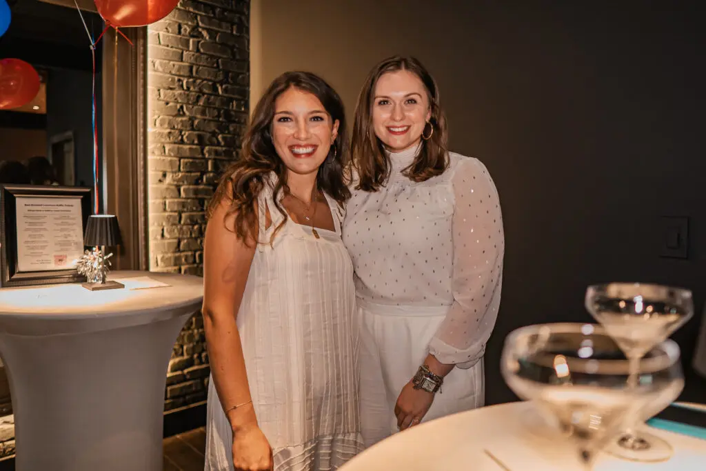 Hannah Cobb, Sarah Scott at the PS-21 Bastille Day soirée benefiting March of Dimes. (Photo by Harold Cua) 