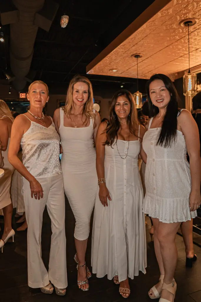Megan Fisher, Mel Camp, Katherine Ross, Mai Pham at the PS-21 Bastille Day soirée benefiting March of Dimes. (Photo by Harold Cua) 