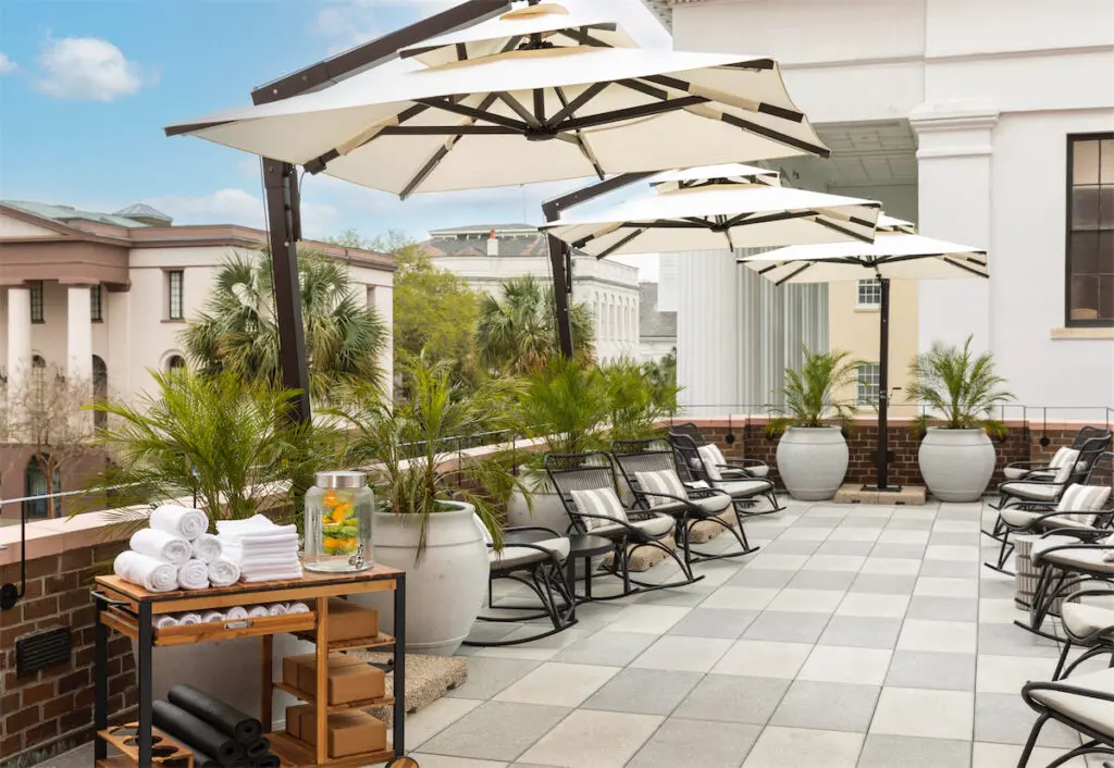 The terrace at The Mills House hosts a free yoga class each morning. (Courtesy of The Mills House)