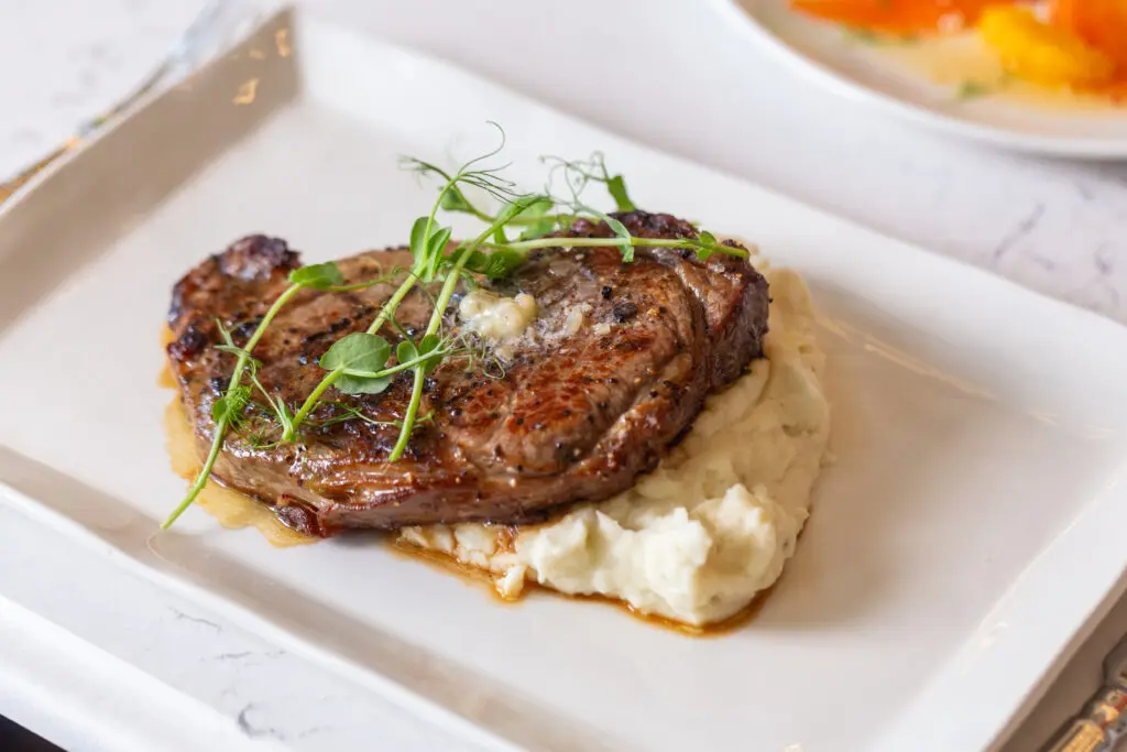 The petite filet mignon is a highlight of the lunch entrée menu. 